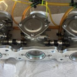 speed plate for triple Dominator manifold Kawasaki